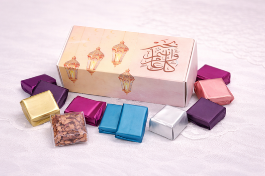 Warm Wishes Eid chocolate box with Arabic message and colorful wrapped chocolates by Meeros Rich Bite
