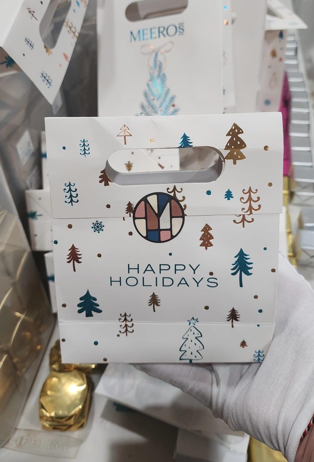 Premium holiday chocolate assortment by Meeros Rich Bite
Holiday chocolate gift bag ready to give
Grab-N-Go holiday chocolates – Michigan handmade